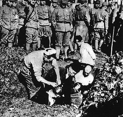 Chinese civilians being buried alive by Japanese soldiers. Atrocities in Nanking included rape, murder, theft, and arson. 