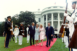 The Fords walk the Nixons to the presidential helicopter after Nixon’s resignation